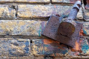 Brick wall with bolt